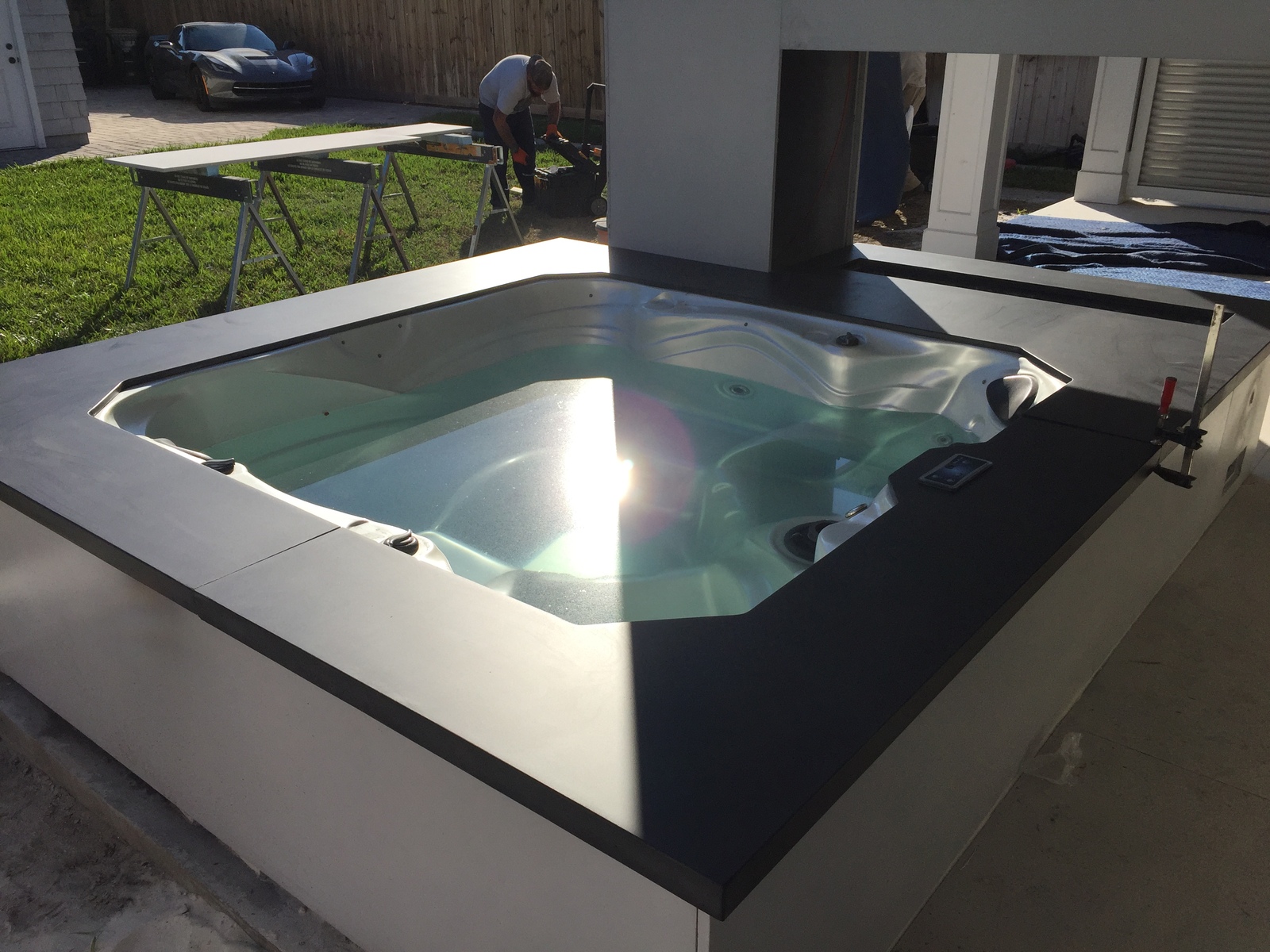 Wrapped Hotub with Comcrete Surround and Tops Caps