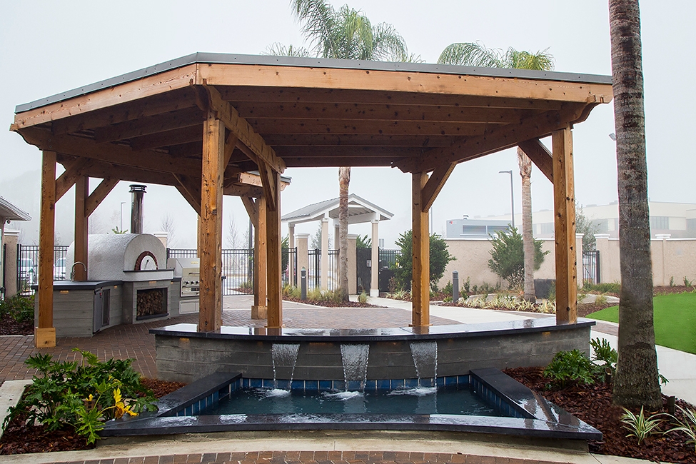 Custom Water Feature, Timber texture wall, Obsidian Caps with Scuppers